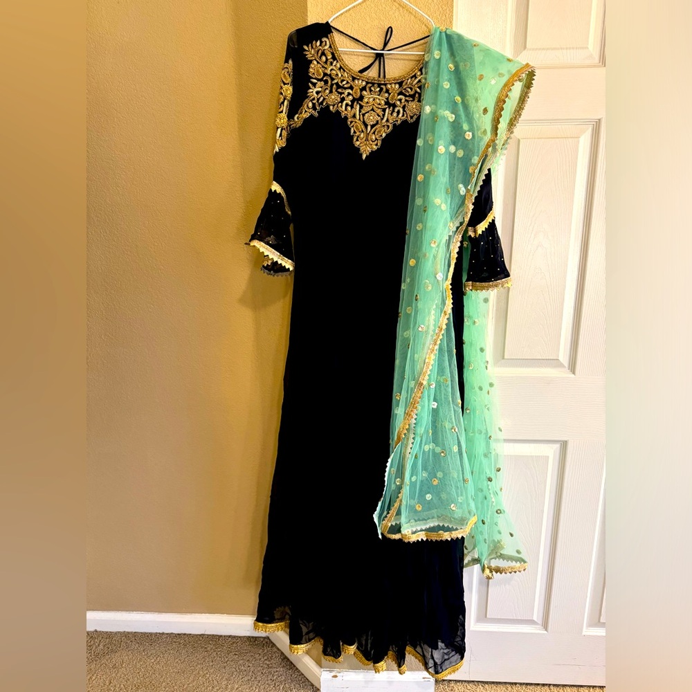 A Large Gown in the color dark blue for Women/Girls